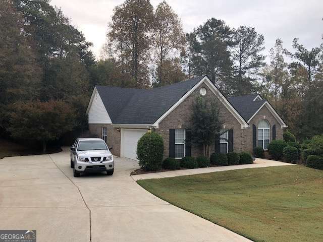 225 Lexington Circle Athens, GA 30605 - Photo 2 of 23 a house view with a car park in front of it