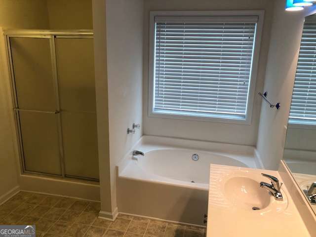 225 Lexington Circle Athens, GA 30605 - Photo 21 of 23 a bathroom with a tub and a sink