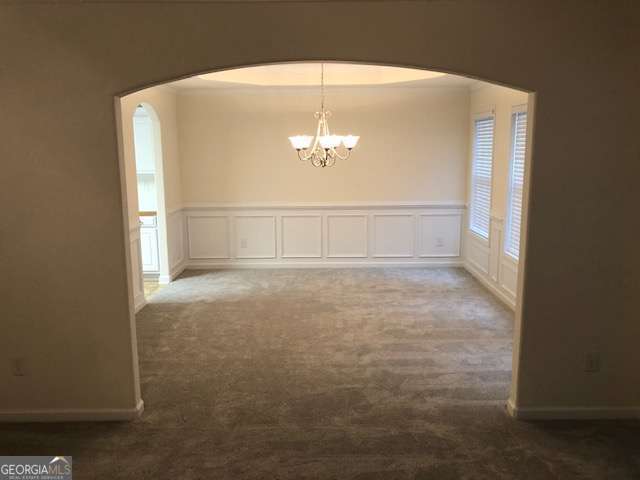 225 Lexington Circle Athens, GA 30605 - Photo 10 of 23 a view of an empty room with a window