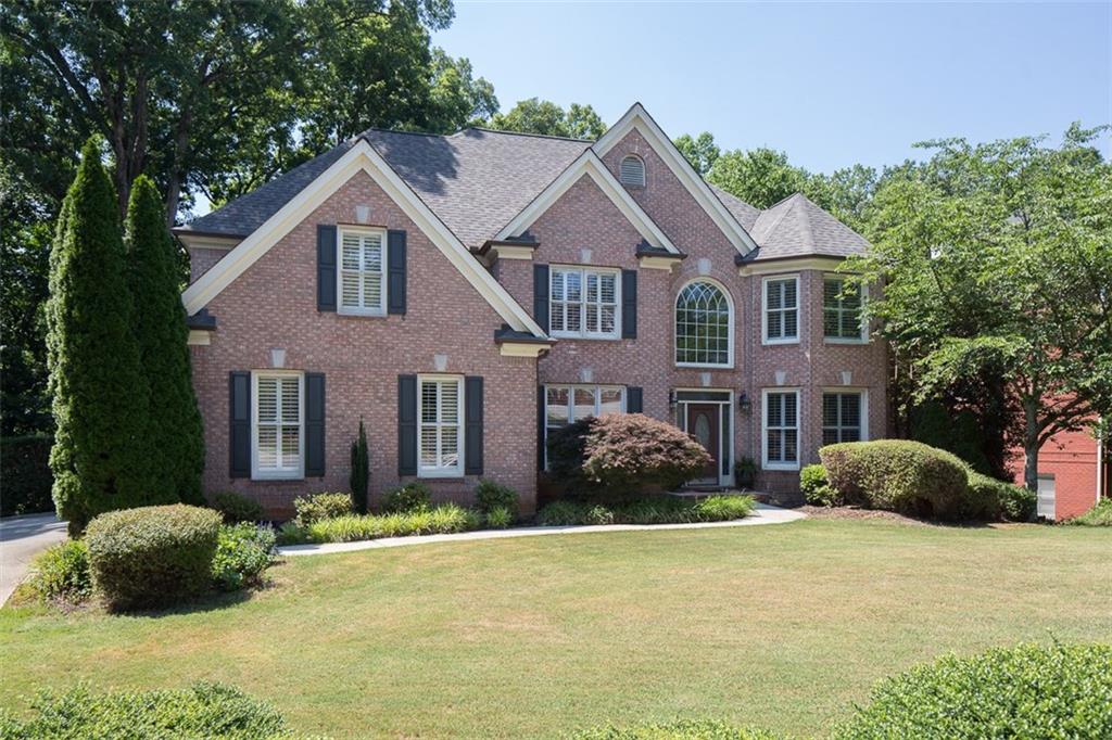 3830 Chimney Ridge Court Cumming, GA 30041 - Photo 1 of 1 Exceptional 3-sided brick home in coveted Three Chimneys Farm subdivision