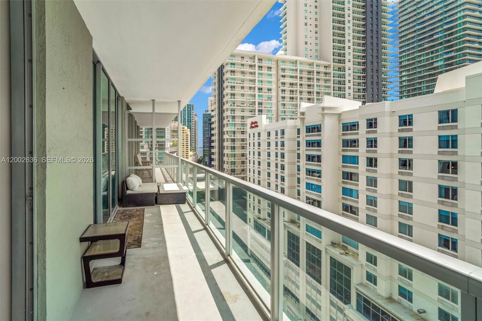 79 Southwest 12th Street, Unit 1605 Miami, FL 33130 - Photo 16 of 30 a view of balcony with a potted plant