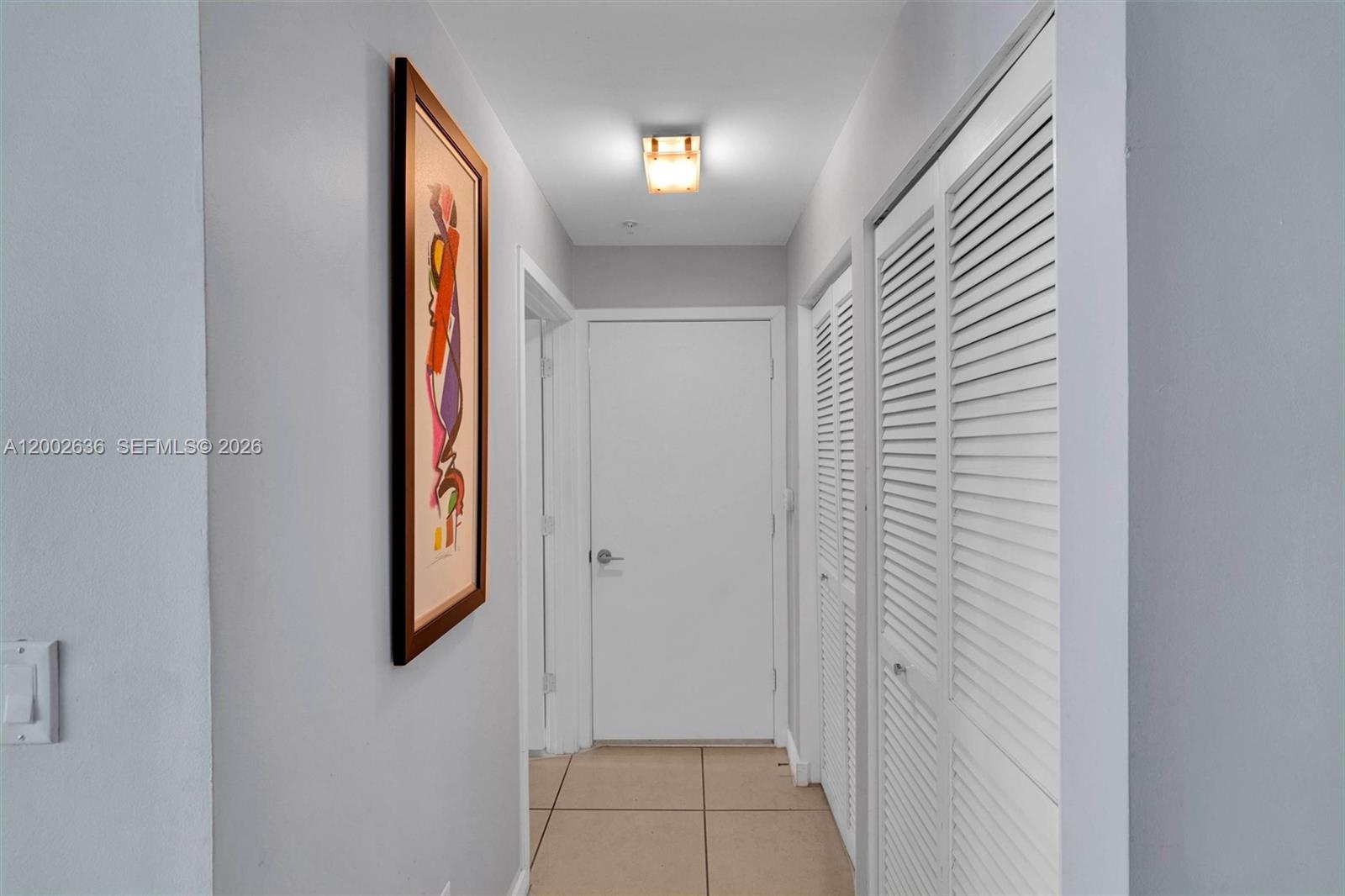 79 Southwest 12th Street, Unit 1605 Miami, FL 33130 - Photo 6 of 30 a view of a hallway with front door