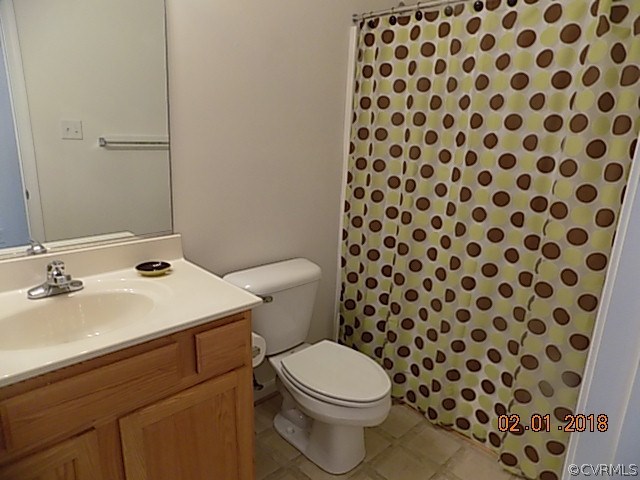 9324 Alcove Grove Road Chesterfield, VA 23832 - Photo 15 of 29 a bathroom with a sink and a toilet