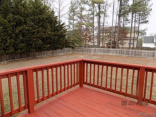 9324 Alcove Grove Road Chesterfield, VA 23832 - Photo 26 of 29 a balcony with wooden floor and fence