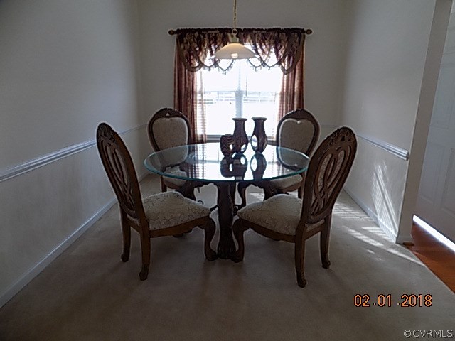 9324 Alcove Grove Road Chesterfield, VA 23832 - Photo 7 of 29 a view of a dining room with furniture and window