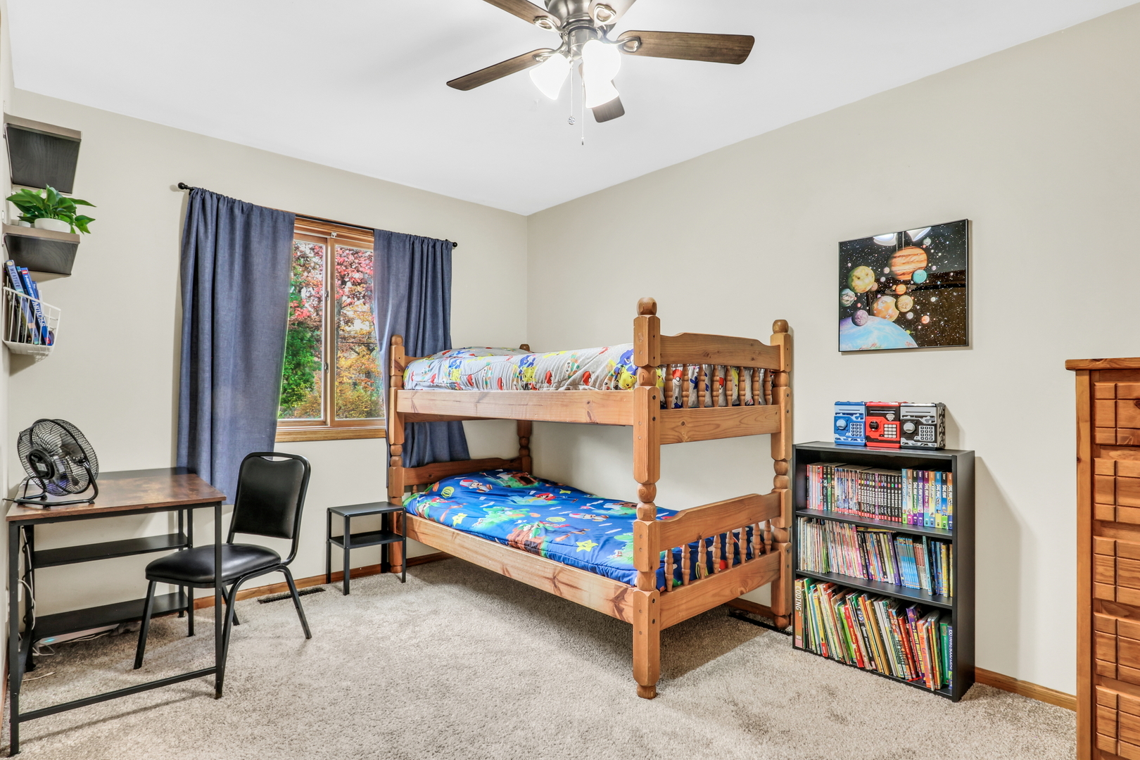 25911 West Highpoint Road Ingleside, IL 60041 - Photo 15 of 29 a bedroom with a bed and a chandelier