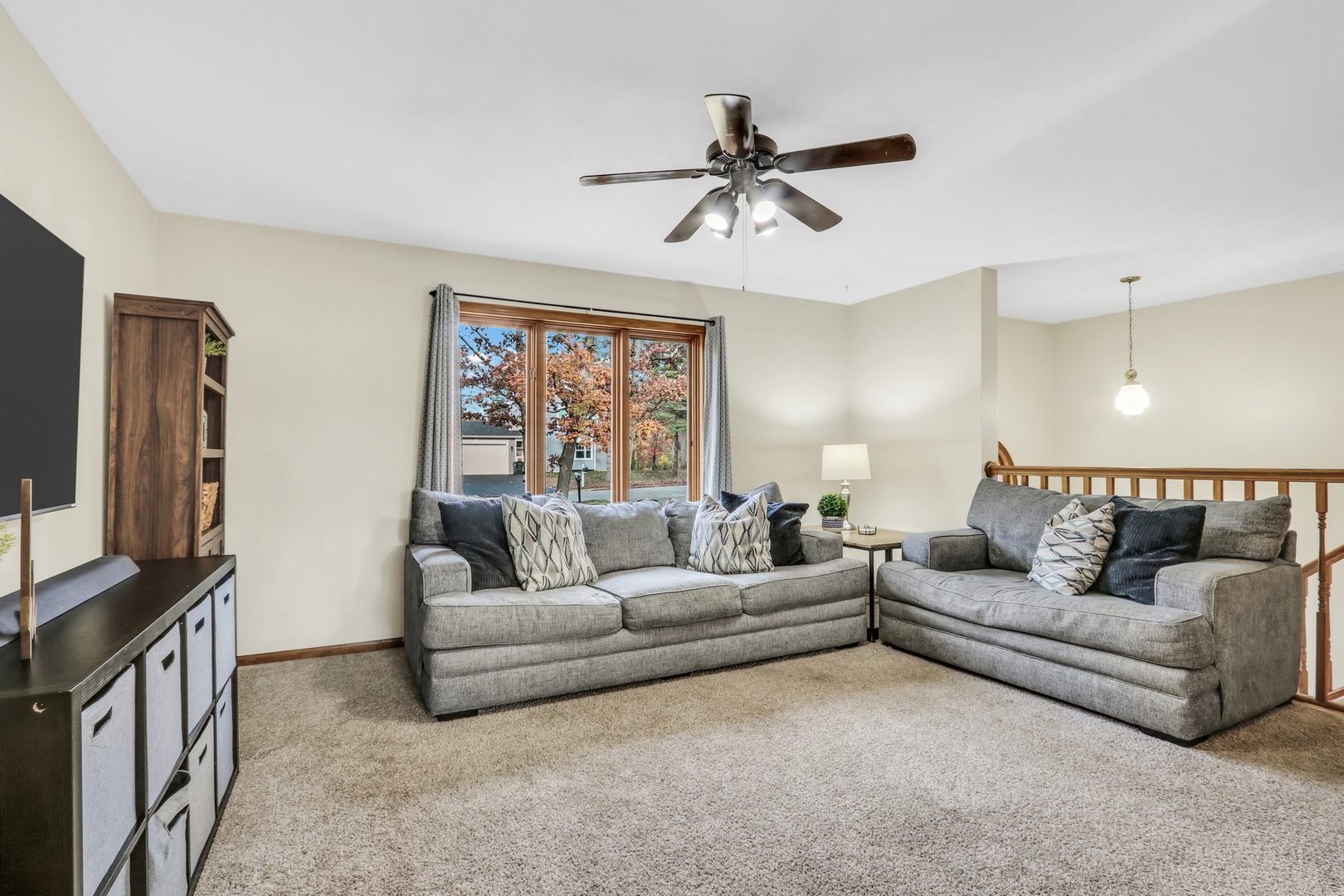 25911 West Highpoint Road Ingleside, IL 60041 - Photo 5 of 29 a living room with furniture and a flat screen tv