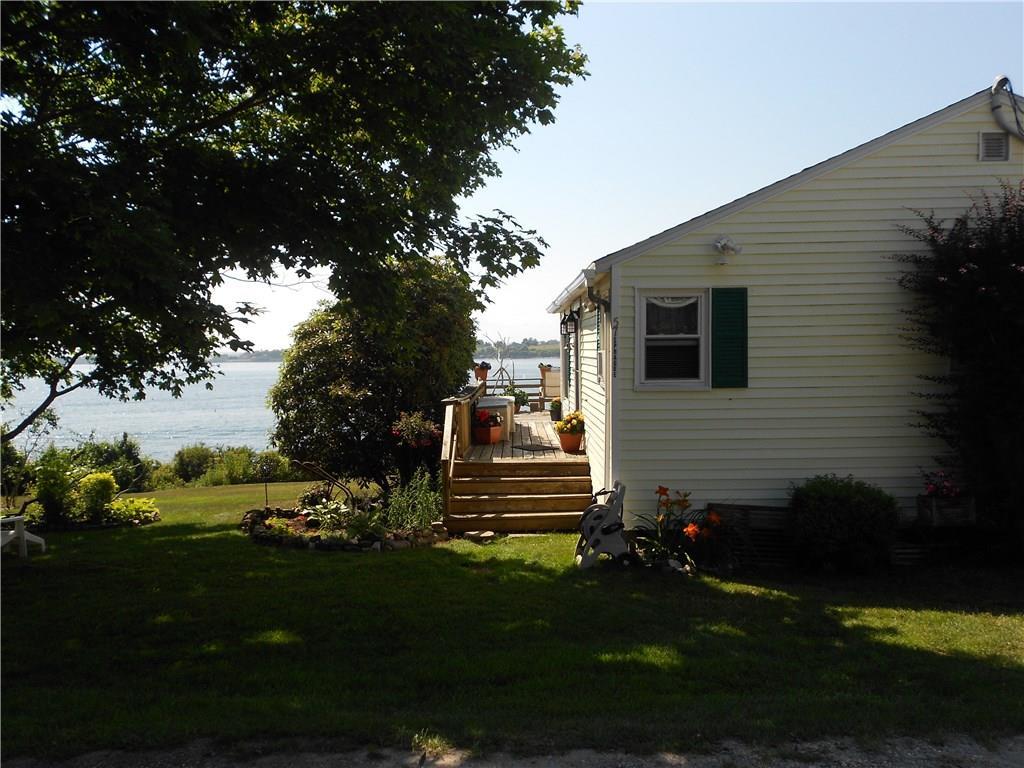 57 West Shore Road Bailey Island, ME 04003 - Photo 8 of 26 South yard of cottage showing a...