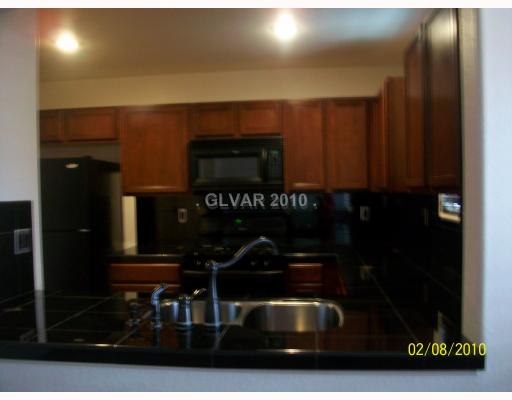 7381 Ristoro Street Las Vegas, NV 89148 - Photo 3 of 13 Kitchen.
