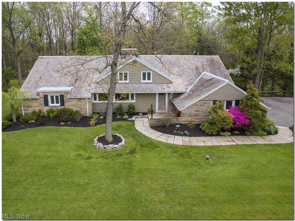 2987 Lander Road Pepper Pike, OH 44124 - Photo 2 of 33 Stunning property set back from the road, over looking 1 acre of pristine, lush garden. Newer siding, gutters, leaf guards