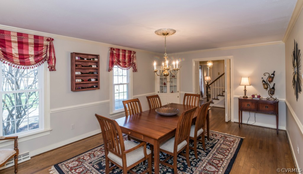 3021 Vistapoint Road Midlothian, VA 23113 - Photo 3 of 24 a view of a dining room with furniture window and wooden floor