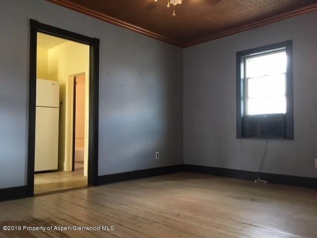 433 East 2nd Street Rifle, CO 81650 - Photo 5 of 8 a view of an empty room with a window