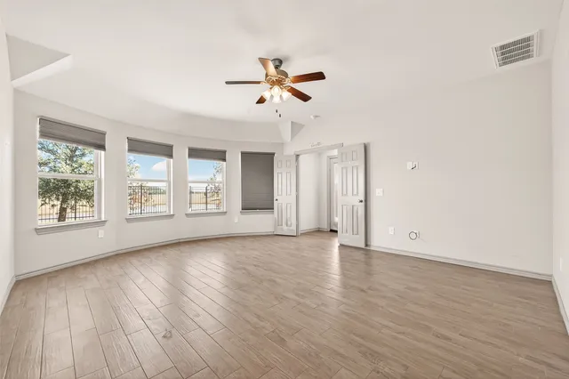 a bathroom with a granite countertop sink a mirror and a vanity