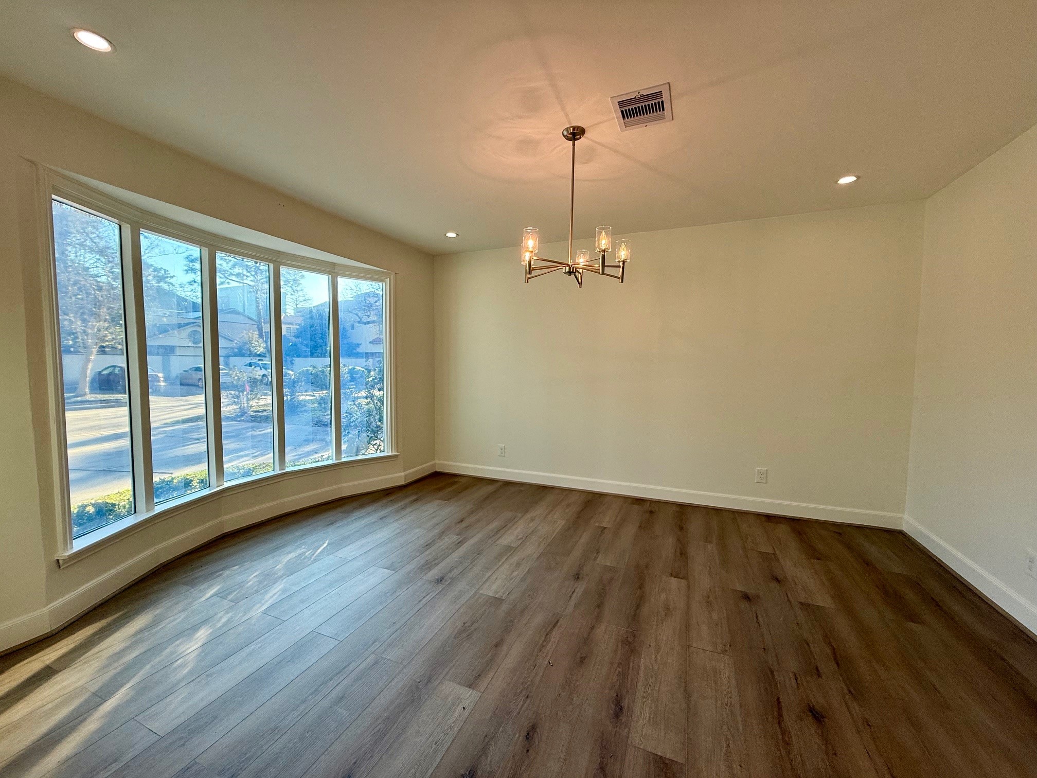 4726 Ivanhoe Street Houston, TX 77027 - Photo 11 of 22 Formal dining room has large windows letting in abundant natural light