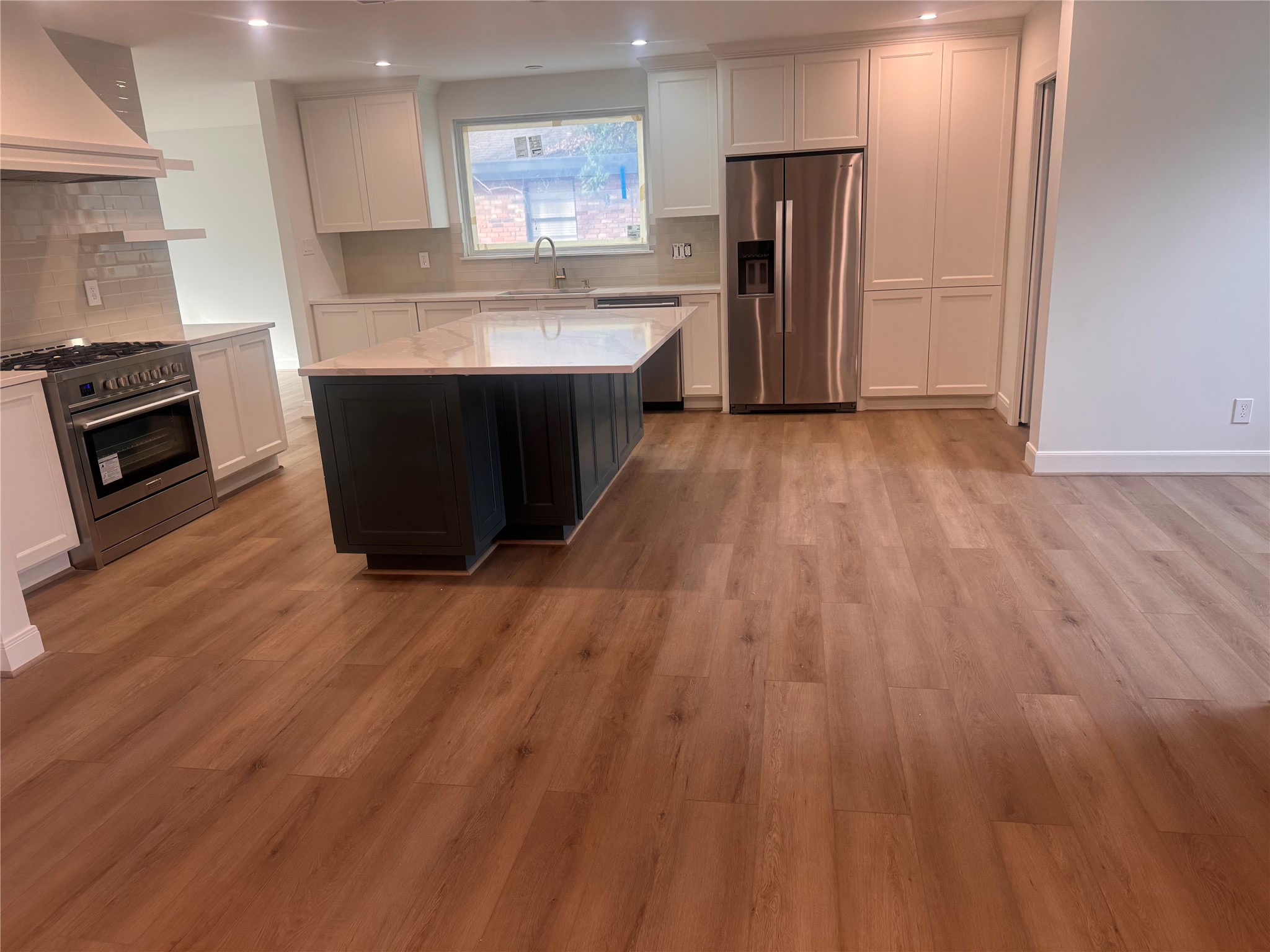 4726 Ivanhoe Street Houston, TX 77027 - Photo 4 of 22 A view of the kitchen from family room, which we'll see next.