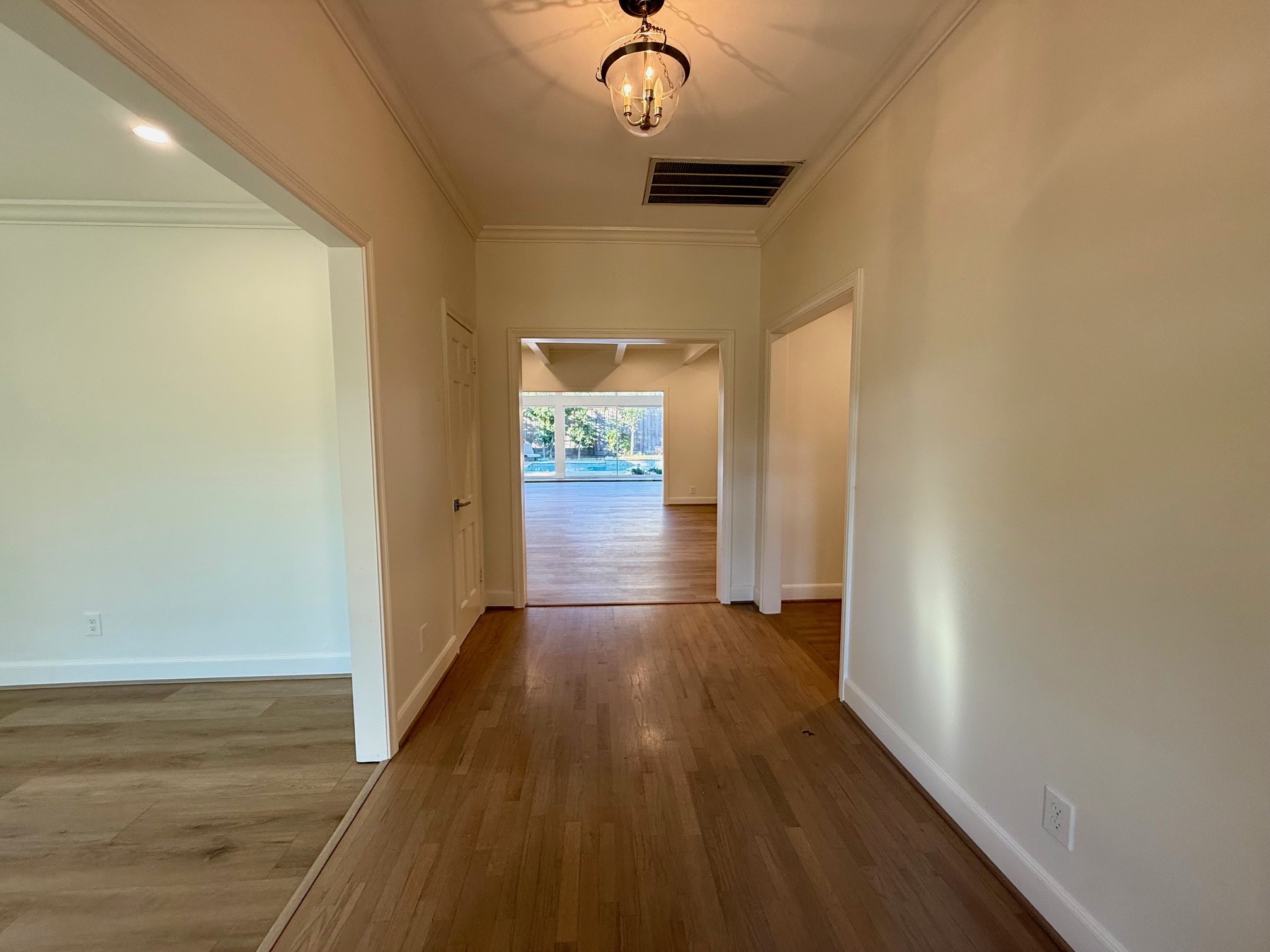 4726 Ivanhoe Street Houston, TX 77027 - Photo 9 of 22 Back at the entry, the foyer leads to both formal and informal living spaces.