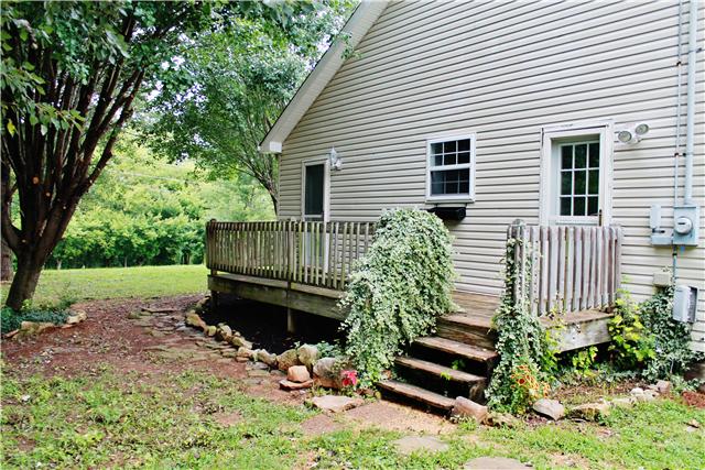 2935 Jack Teasley Road Pleasant View, TN 37146 - Photo 17 of 18 Side deck with all new mulch and updated landscaping
