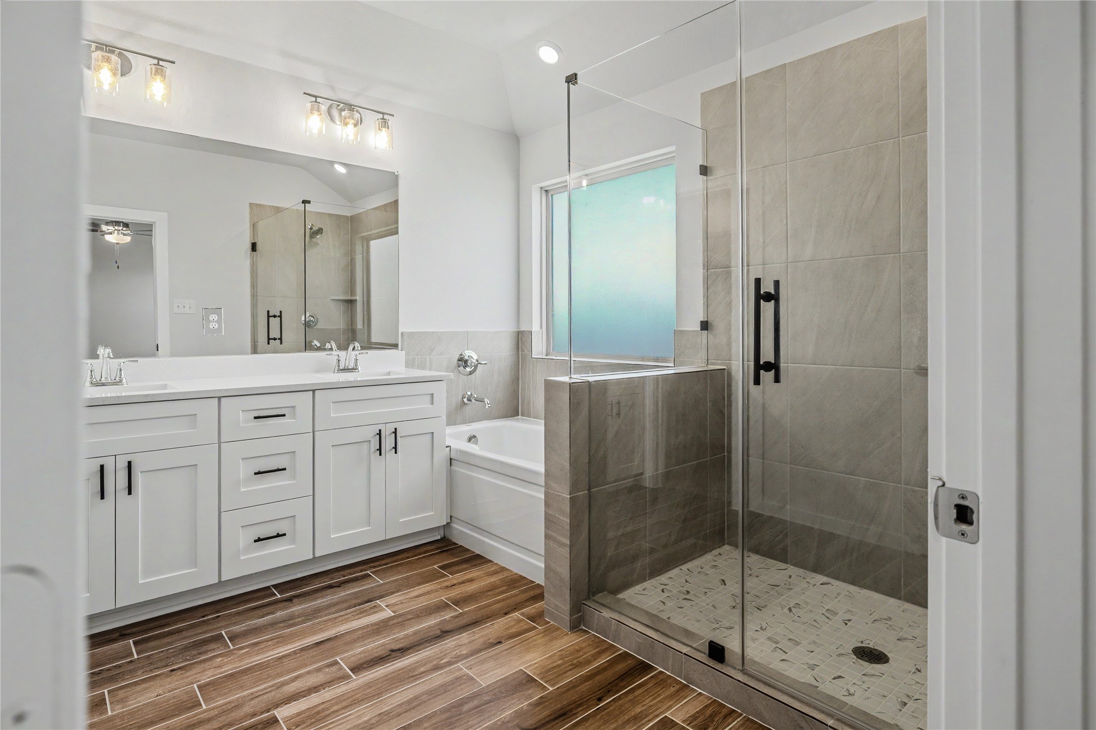 6427 Bolinas Court Rosharon, TX 77583 - Photo 27 of 49 a bathroom with a shower a sink and a mirror