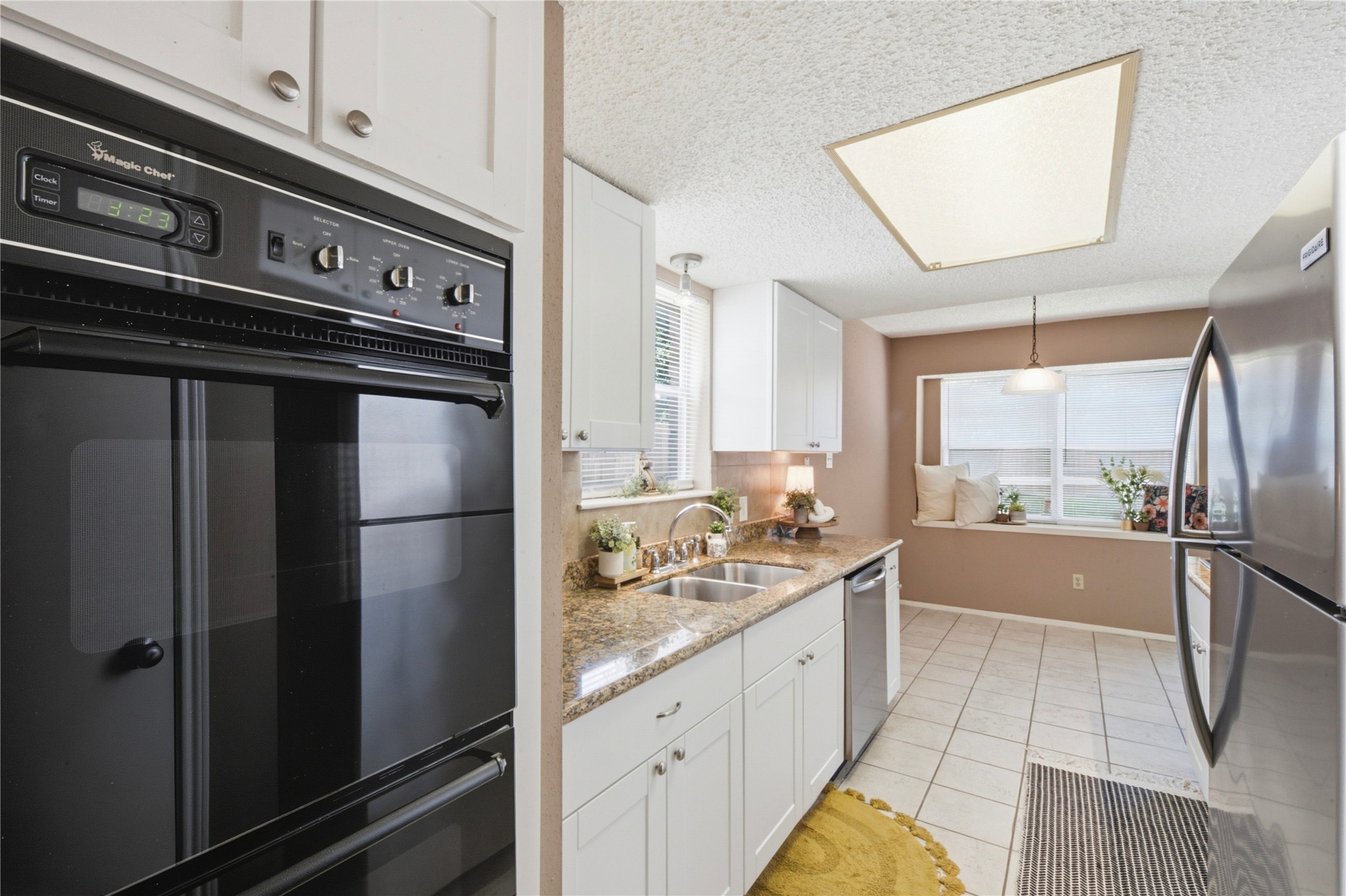 4019 Postwood Drive Spring, TX 77388 - Photo 13 of 50 a kitchen with stainless steel appliances granite countertop a refrigerator and a sink