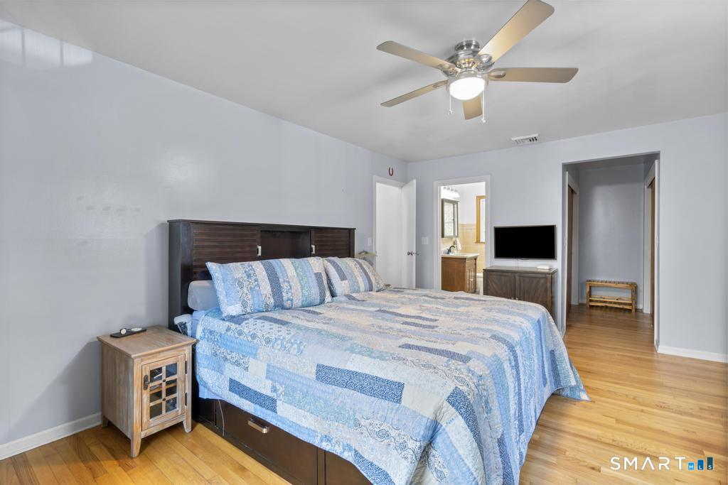 45 Ansonia Road Woodbridge, CT 06525 - Photo 14 of 23 Primary bedroom with a full bathroom