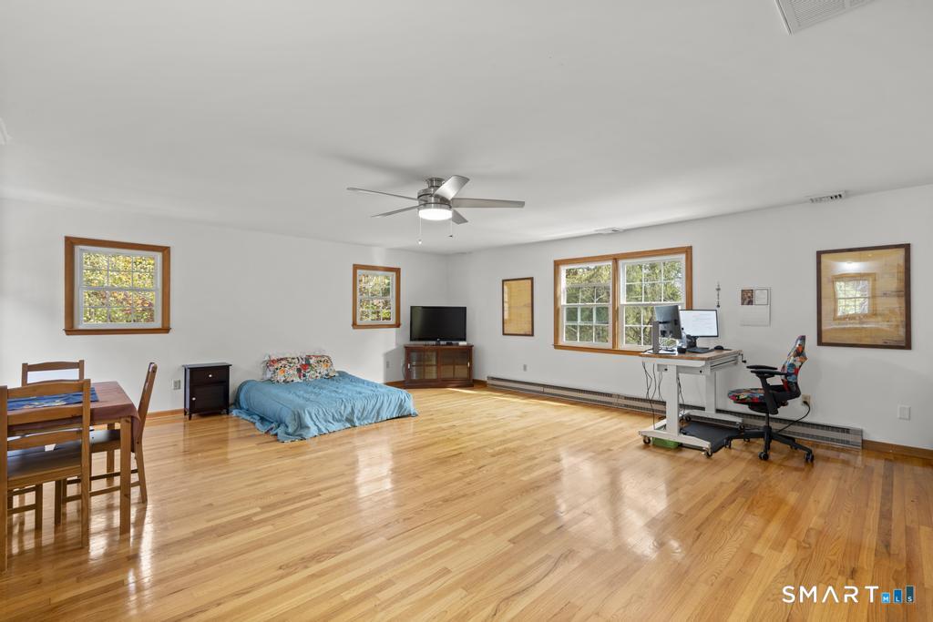 45 Ansonia Road Woodbridge, CT 06525 - Photo 19 of 23 A beautiful bonus room that has it's own entrance from the deck
