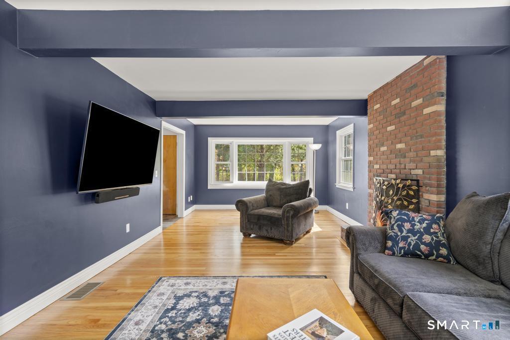 45 Ansonia Road Woodbridge, CT 06525 - Photo 10 of 23 living room with fireplace