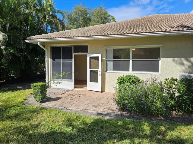 a view of a house with a garden