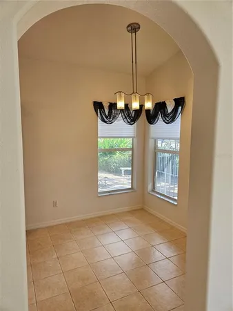 a view of an empty room and window