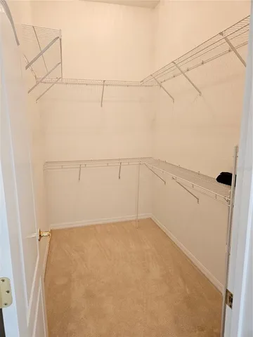 a view of a room with racks on the wall