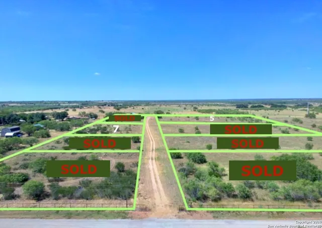 a view of building with yard