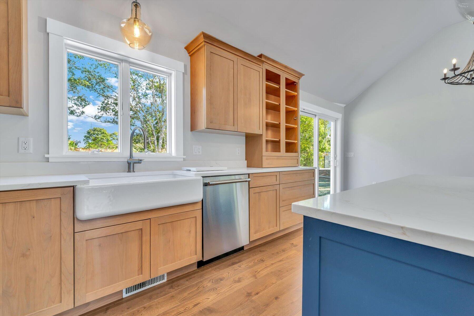 25 Percival Road East Falmouth, MA 02536 - Photo 14 of 31 a kitchen with a sink cabinets stainless steel appliances and a large window
