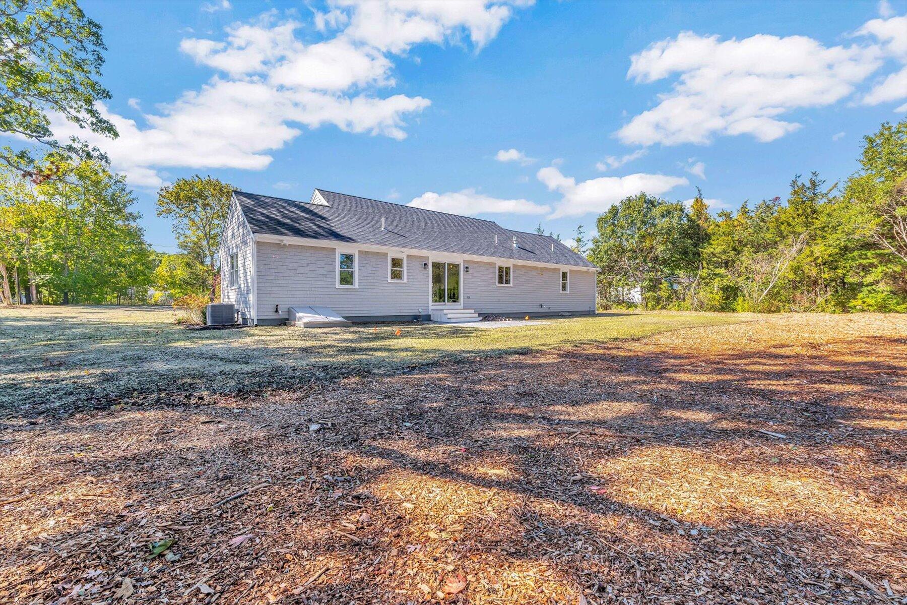 25 Percival Road East Falmouth, MA 02536 - Photo 28 of 31 a view of big yard with a house