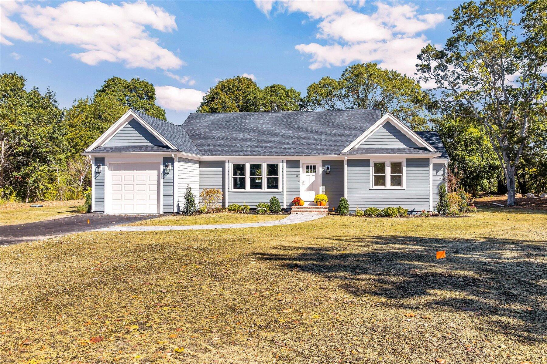 25 Percival Road East Falmouth, MA 02536 - Photo 29 of 31 a view of a house with a swimming pool and a yard