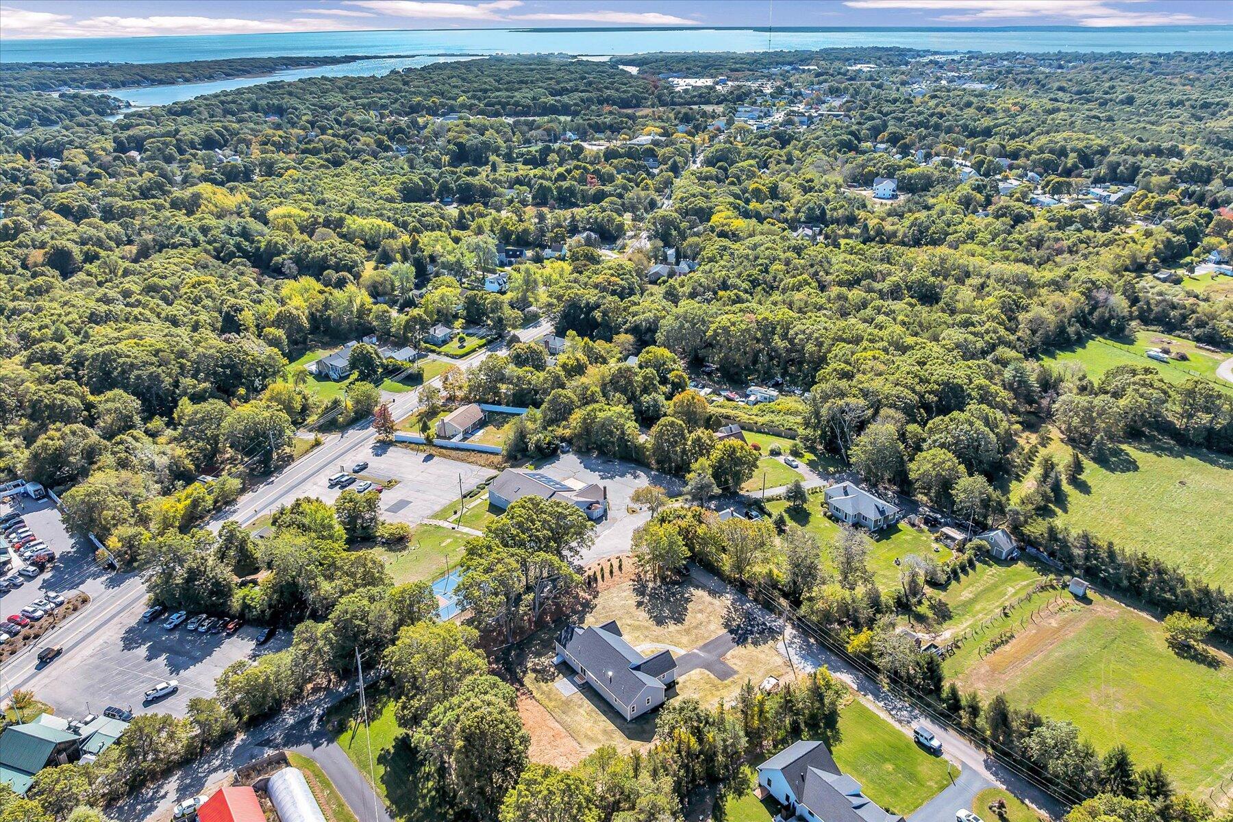 25 Percival Road East Falmouth, MA 02536 - Photo 4 of 31 an aerial view of a houses with a yard