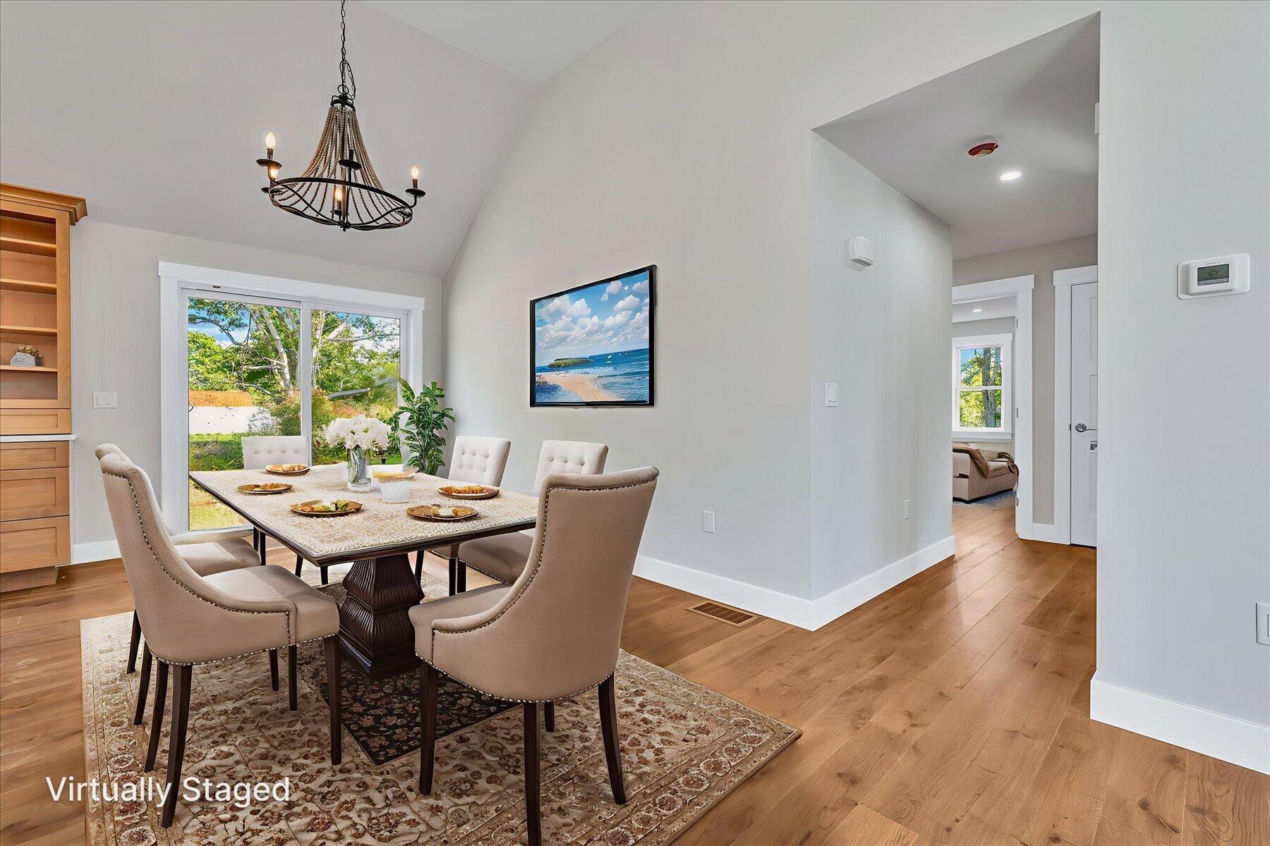 25 Percival Road East Falmouth, MA 02536 - Photo 8 of 31 a view of a dining room with furniture window and wooden floor
