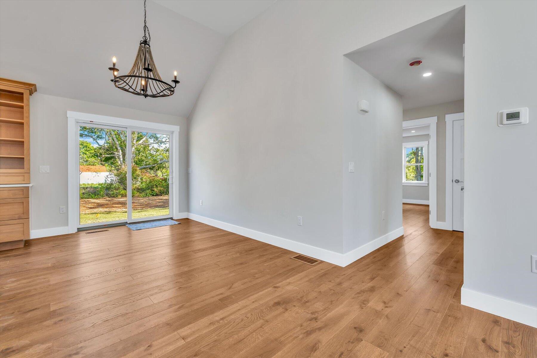 25 Percival Road East Falmouth, MA 02536 - Photo 9 of 31 a view of an empty room with wooden floor and a window