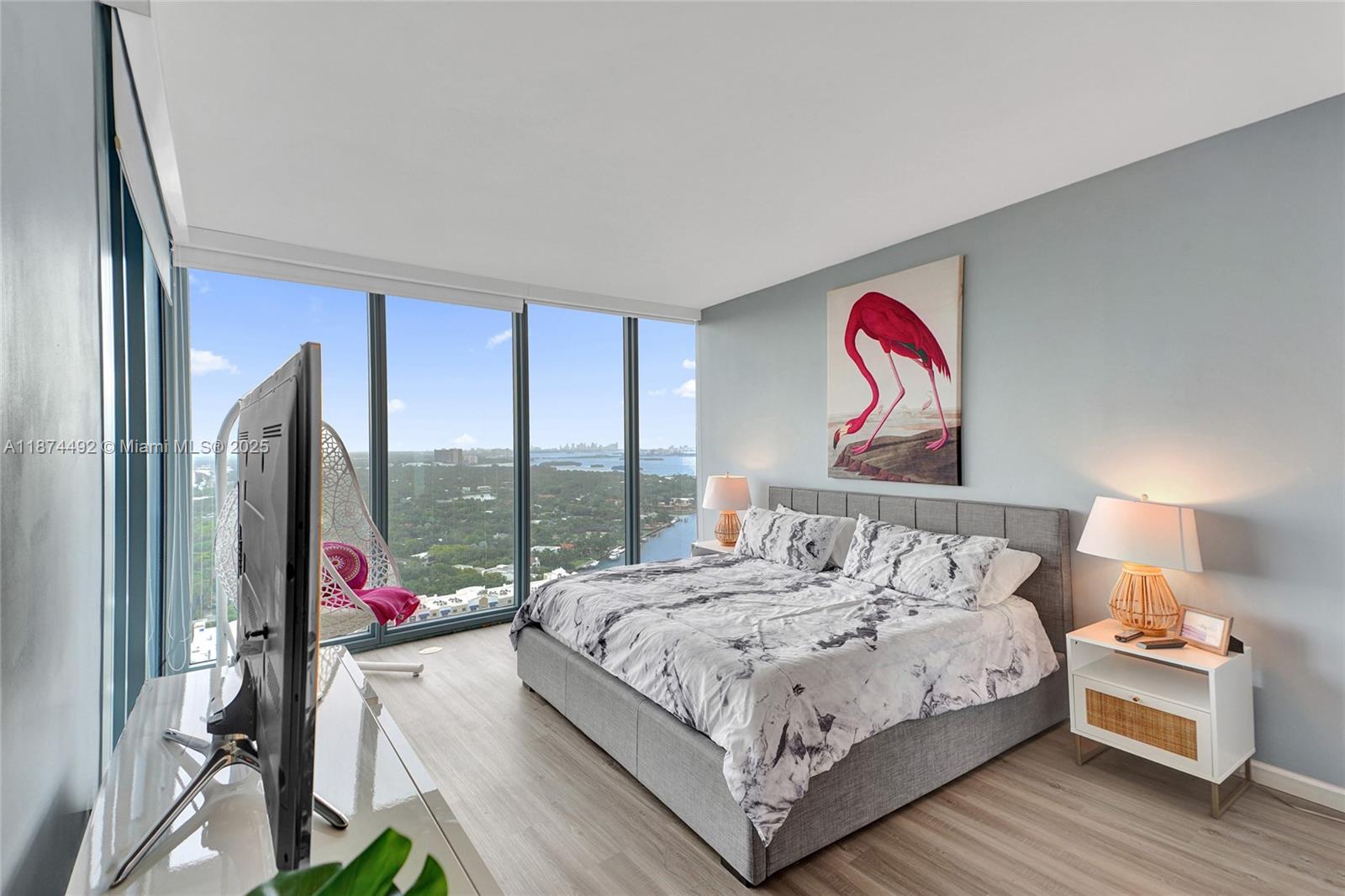 601 Northeast 36th Street, Unit 2703 Miami, FL 33137 - Photo 11 of 64 a bedroom with a bed and a large window