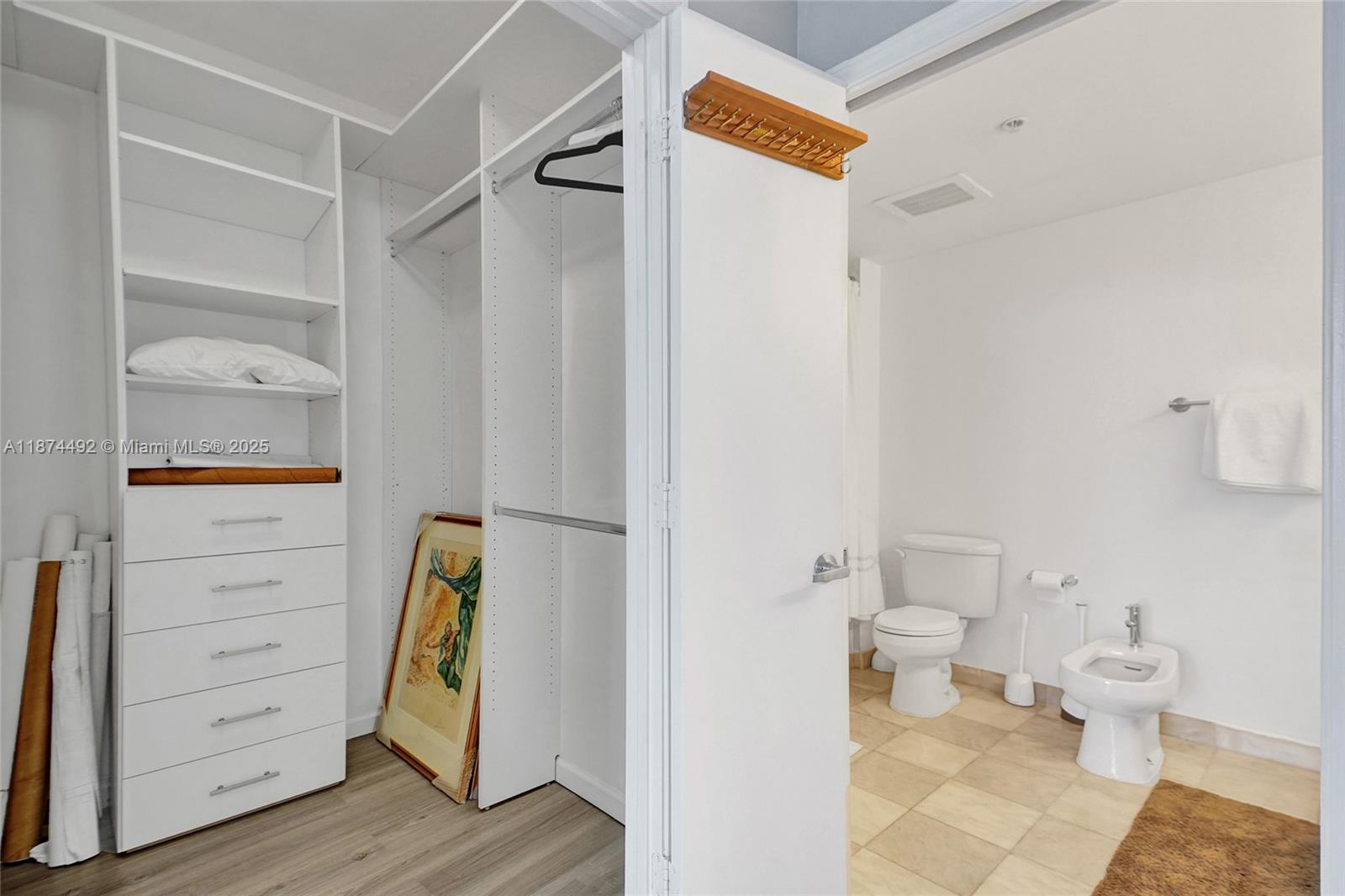 601 Northeast 36th Street, Unit 2703 Miami, FL 33137 - Photo 19 of 64 a bathroom with a toilet and a shower