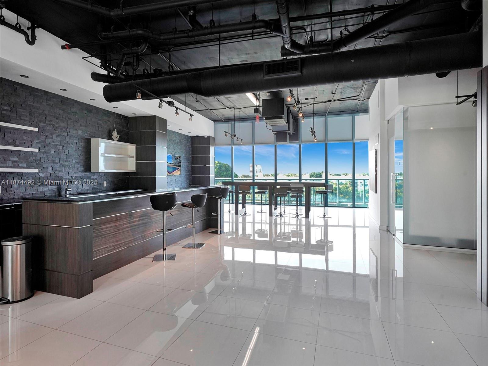 601 Northeast 36th Street, Unit 2703 Miami, FL 33137 - Photo 49 of 64 a view of a kitchen