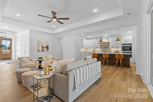 a bed room with furniture and white walls