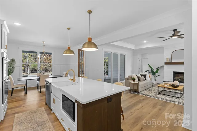 a view of living room filled with furniture and window