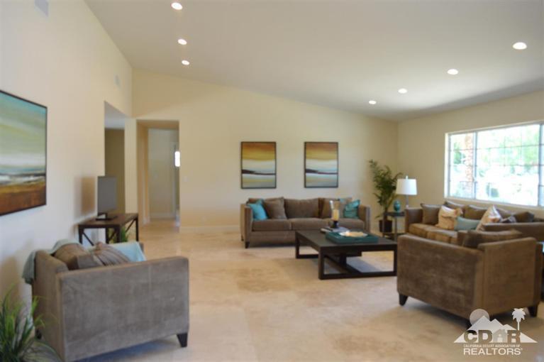 72825 Bel Air Road Palm Desert, CA 92260 - Photo 12 of 23 a living room with furniture and a window