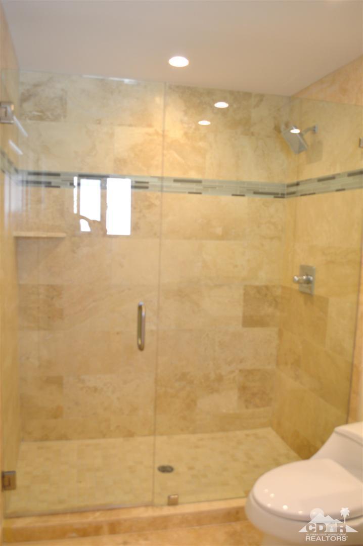 72825 Bel Air Road Palm Desert, CA 92260 - Photo 17 of 23 a bathroom with a shower and a toilet