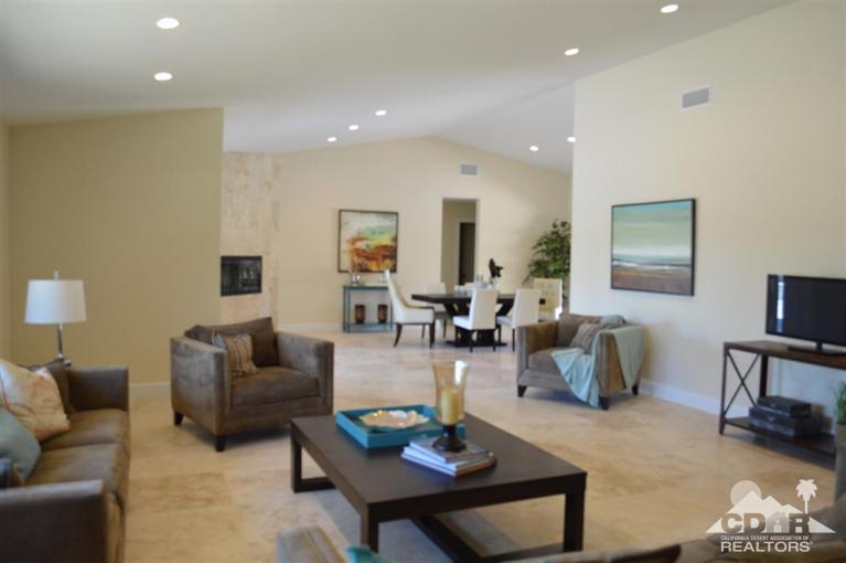 72825 Bel Air Road Palm Desert, CA 92260 - Photo 8 of 23 a living room with furniture and a table