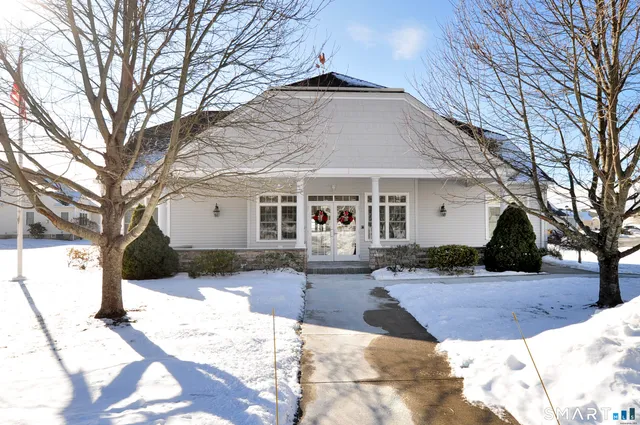 a room with a bed and a window