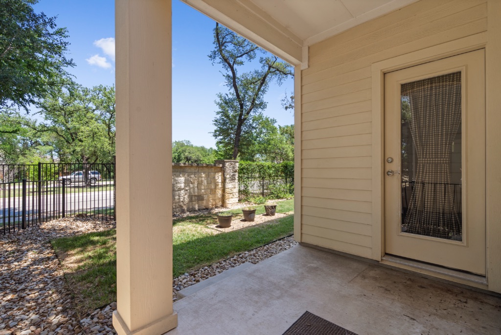 11229 Avery Station Loop, Unit 36 Austin, TX 78717 - Photo 31 of 37 Fenced backyard featuring a patio area