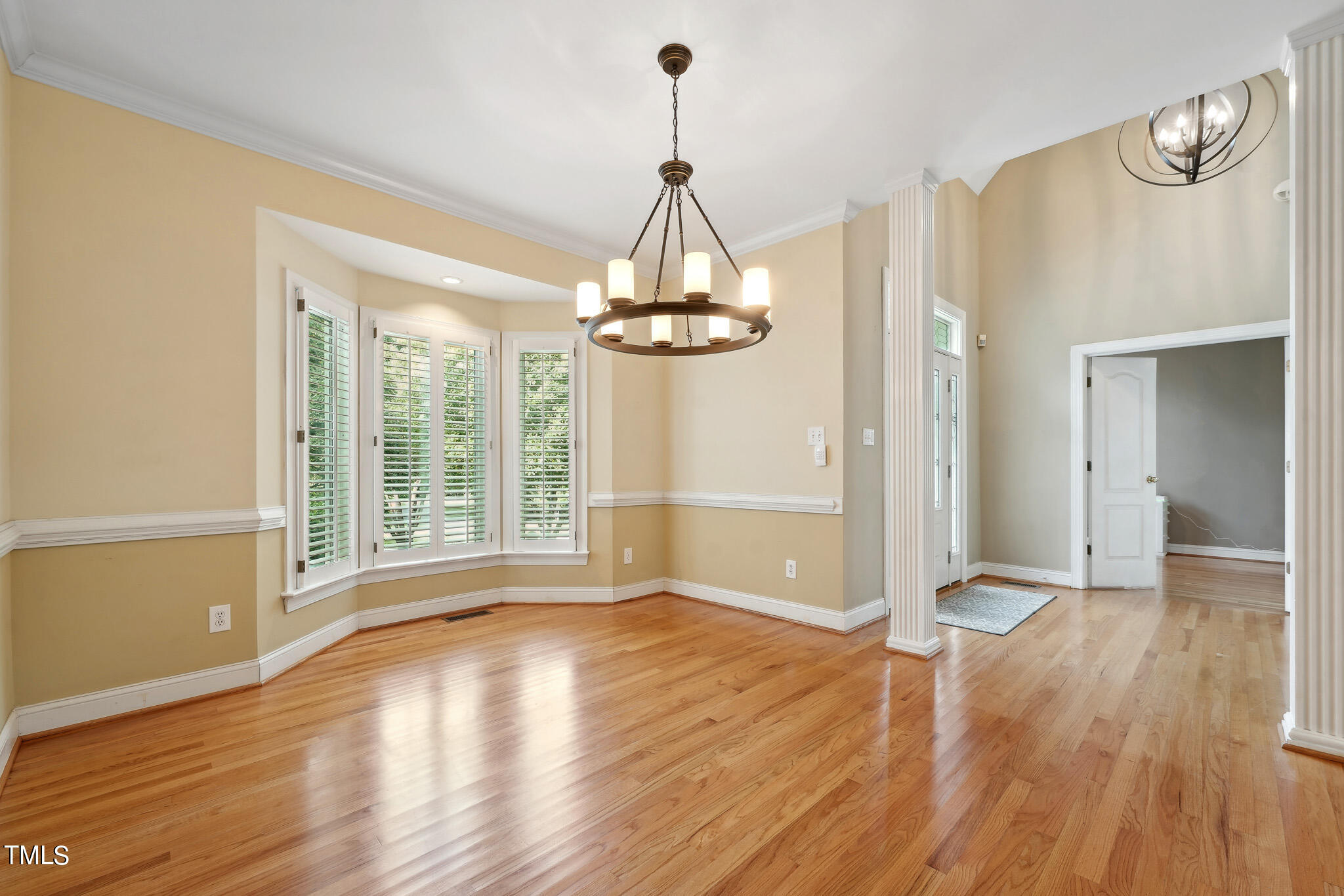 2508 Barton Ridge Court Raleigh, NC 27613 - Photo 17 of 41 a view of an empty room with wooden floor and a window
