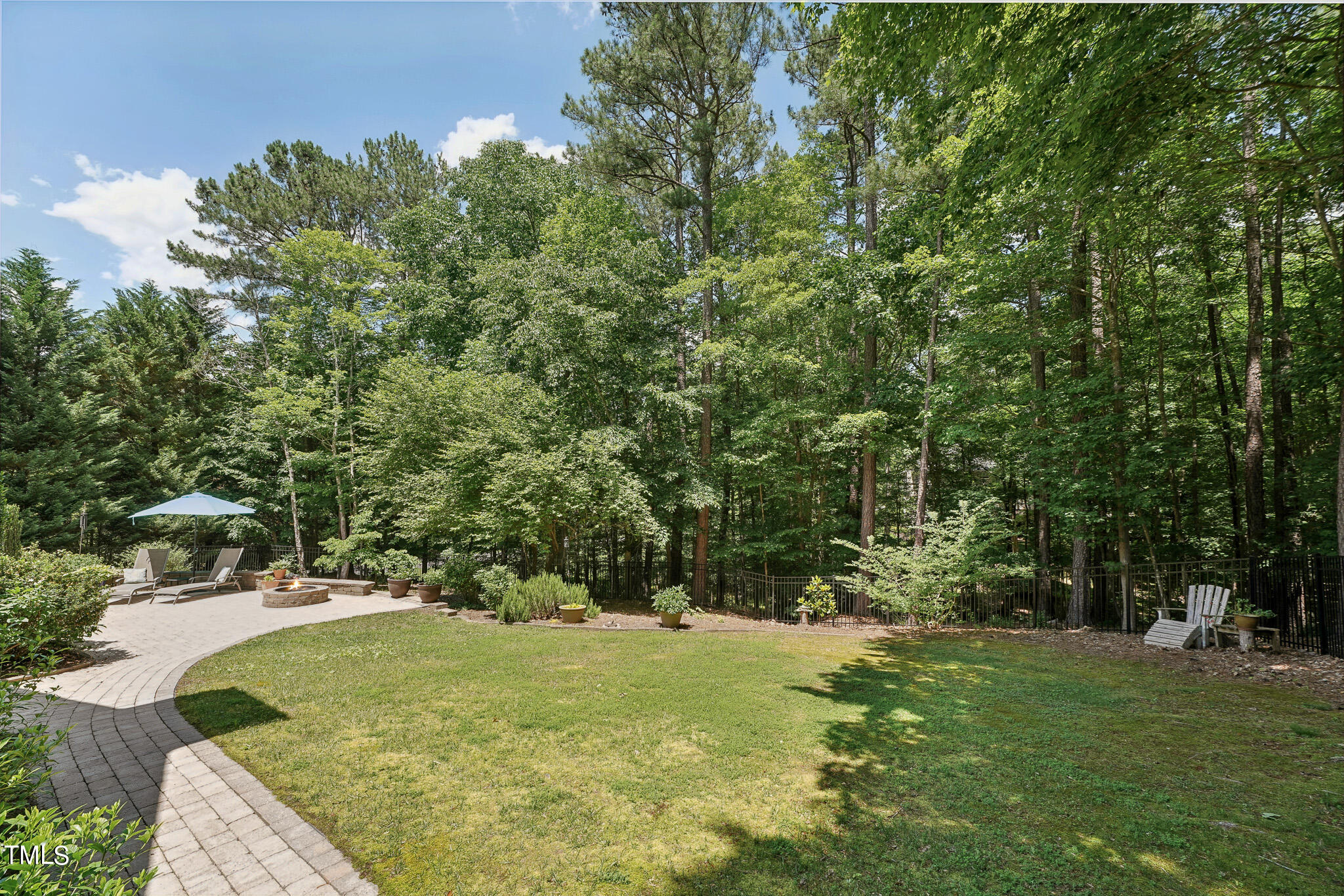 2508 Barton Ridge Court Raleigh, NC 27613 - Photo 35 of 41 a swimming pool with trees in the background