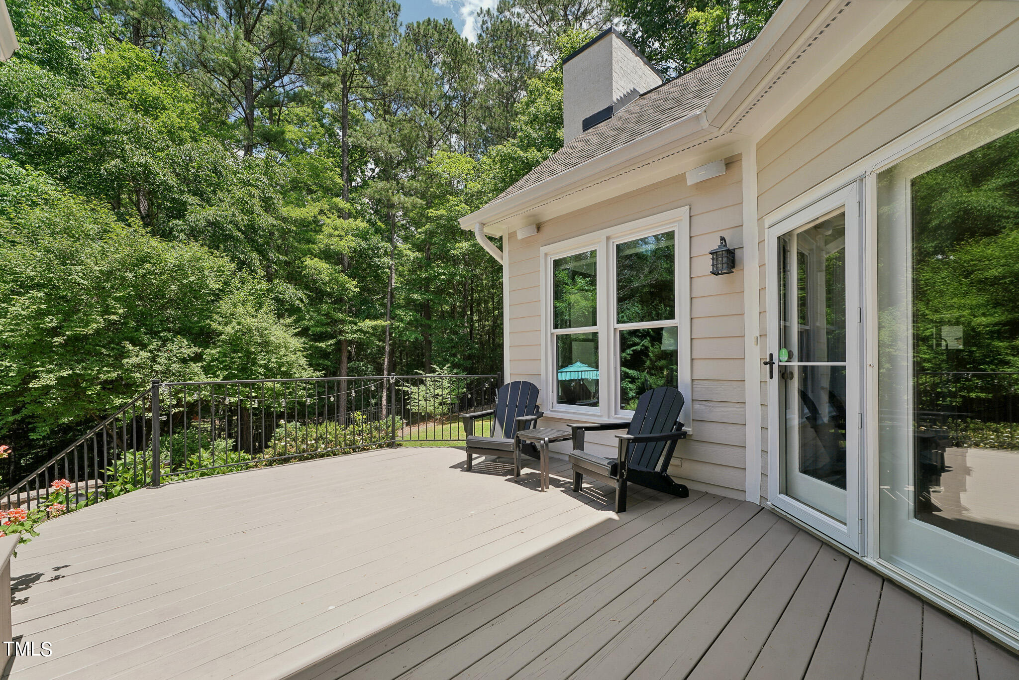 2508 Barton Ridge Court Raleigh, NC 27613 - Photo 38 of 41 a patio with table and chairs and potted plants