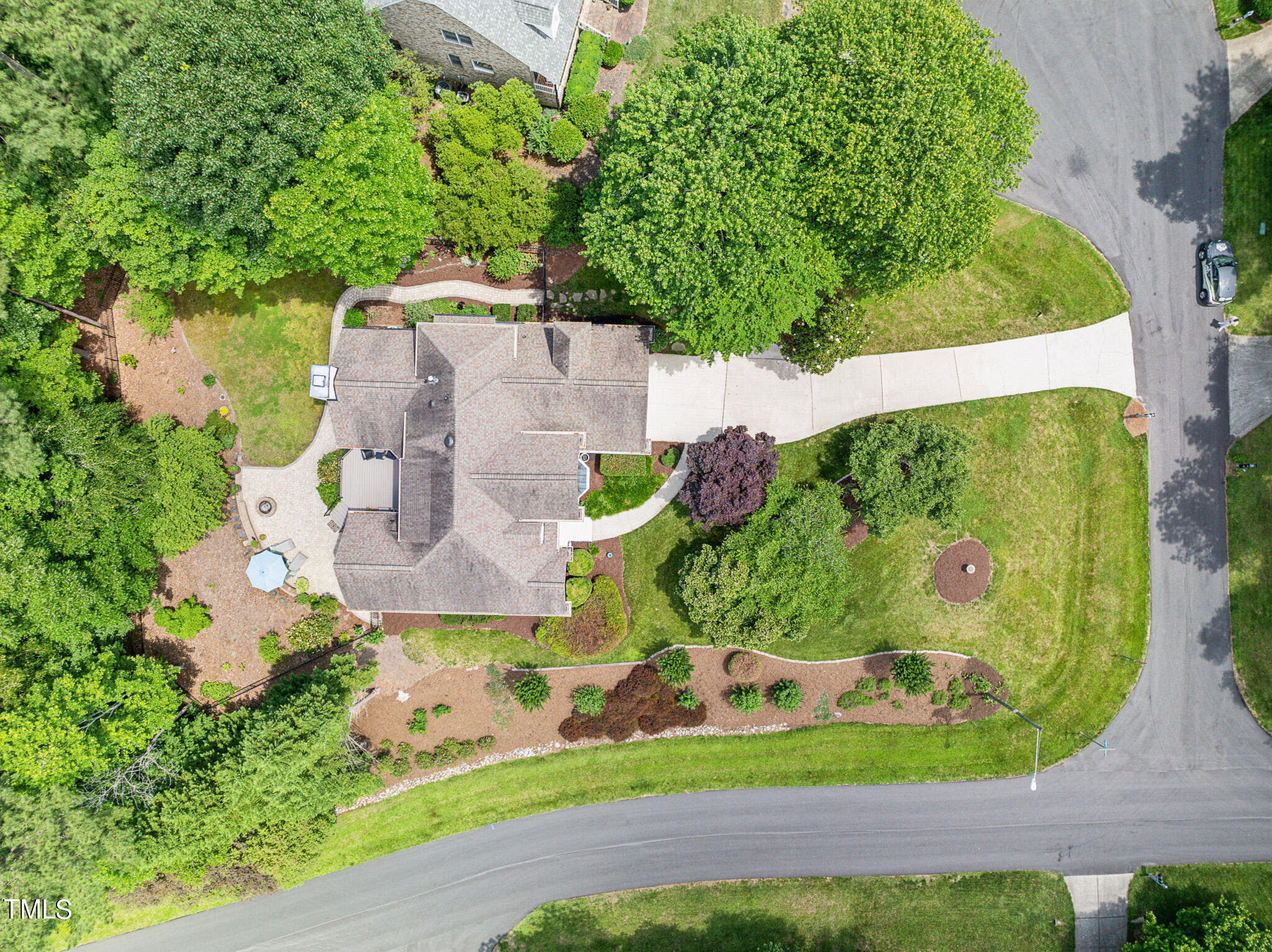 2508 Barton Ridge Court Raleigh, NC 27613 - Photo 41 of 41 an aerial view of a house with a garden and plants